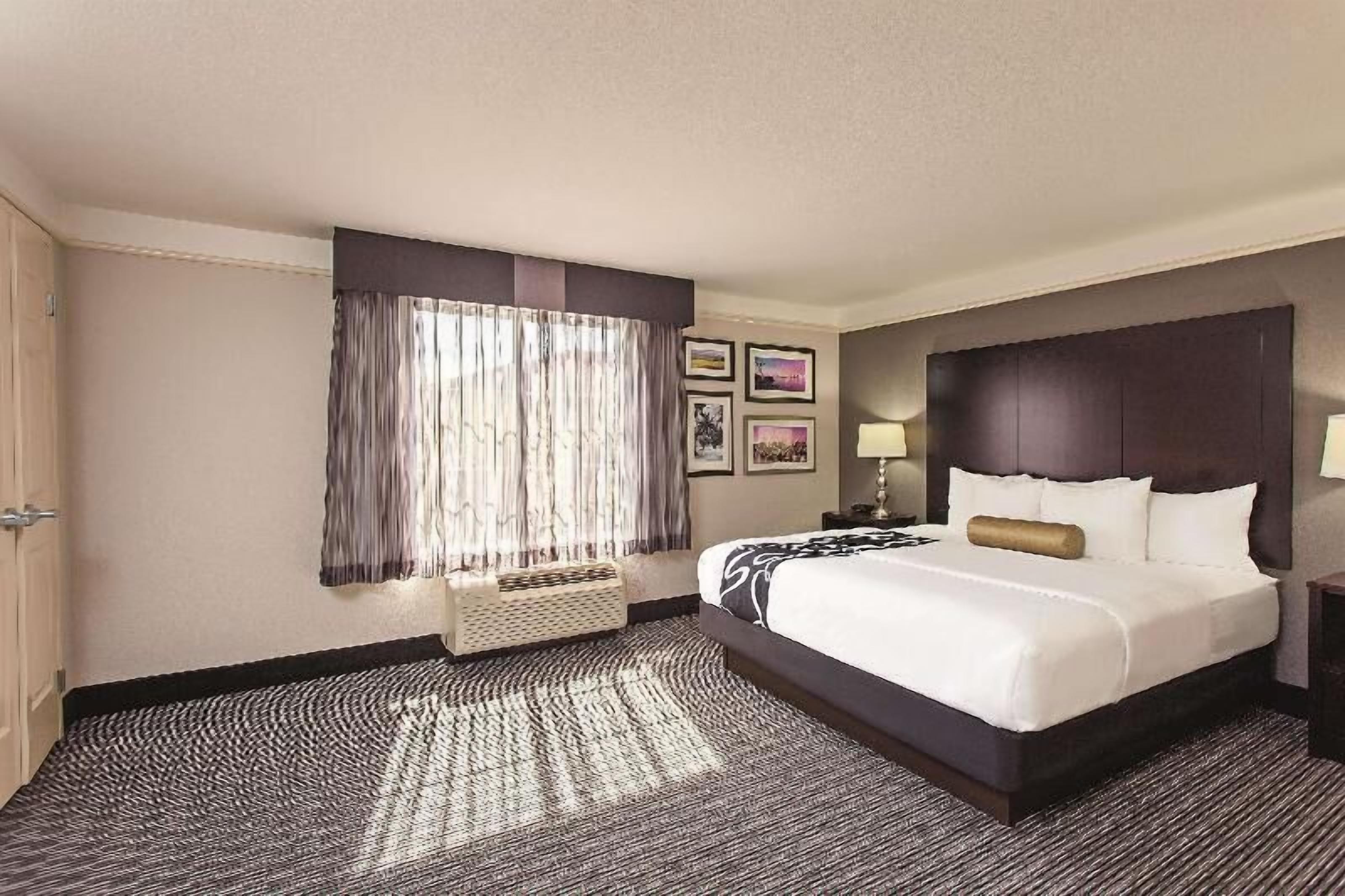 Premium bedding, desk, blackout drapes, iron/ironing board