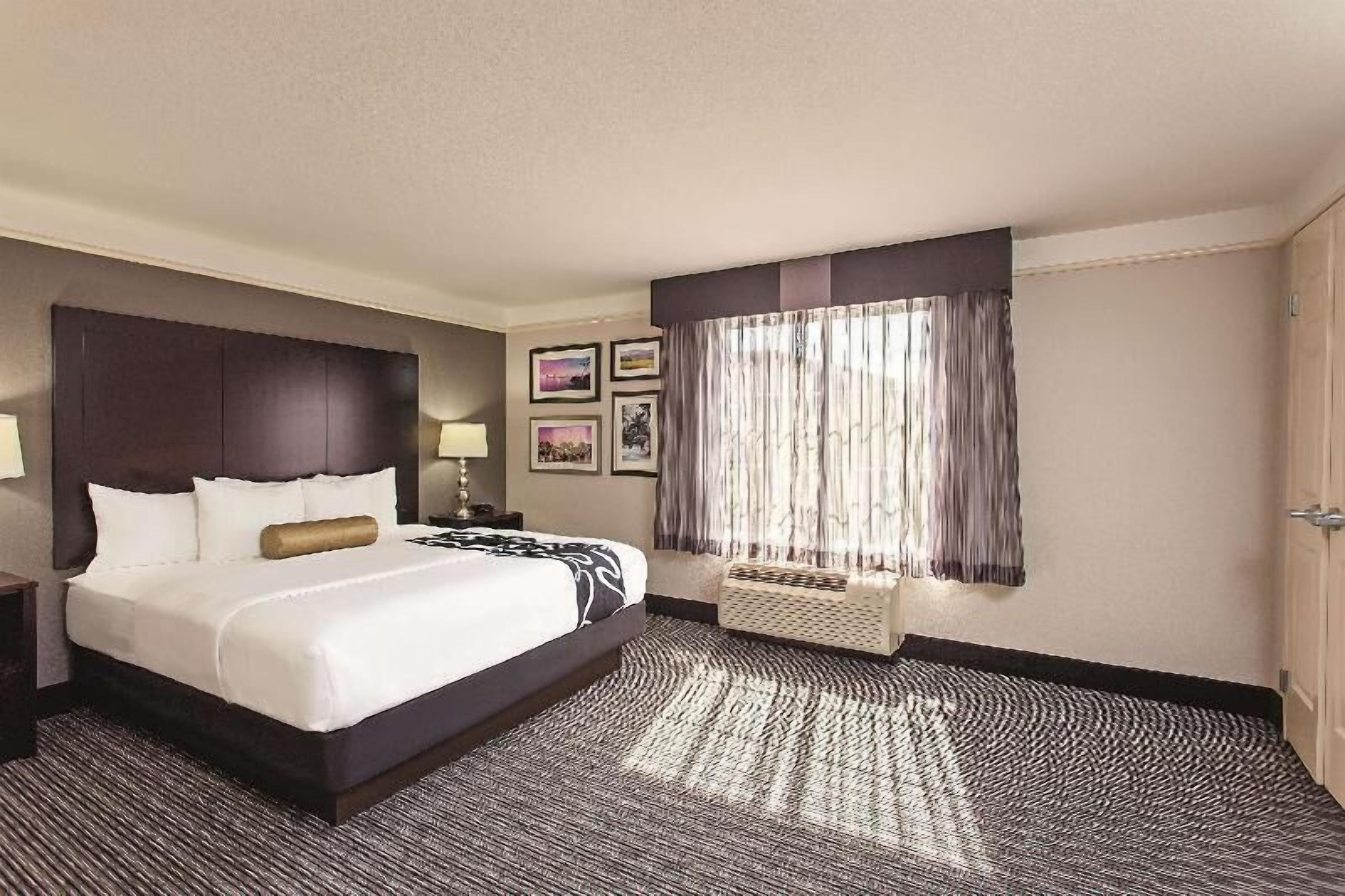 Premium bedding, desk, blackout drapes, iron/ironing board