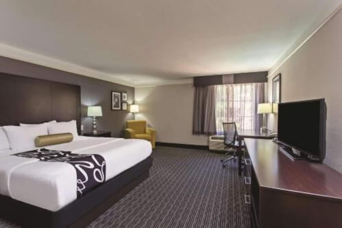 Premium bedding, desk, blackout drapes, iron/ironing board