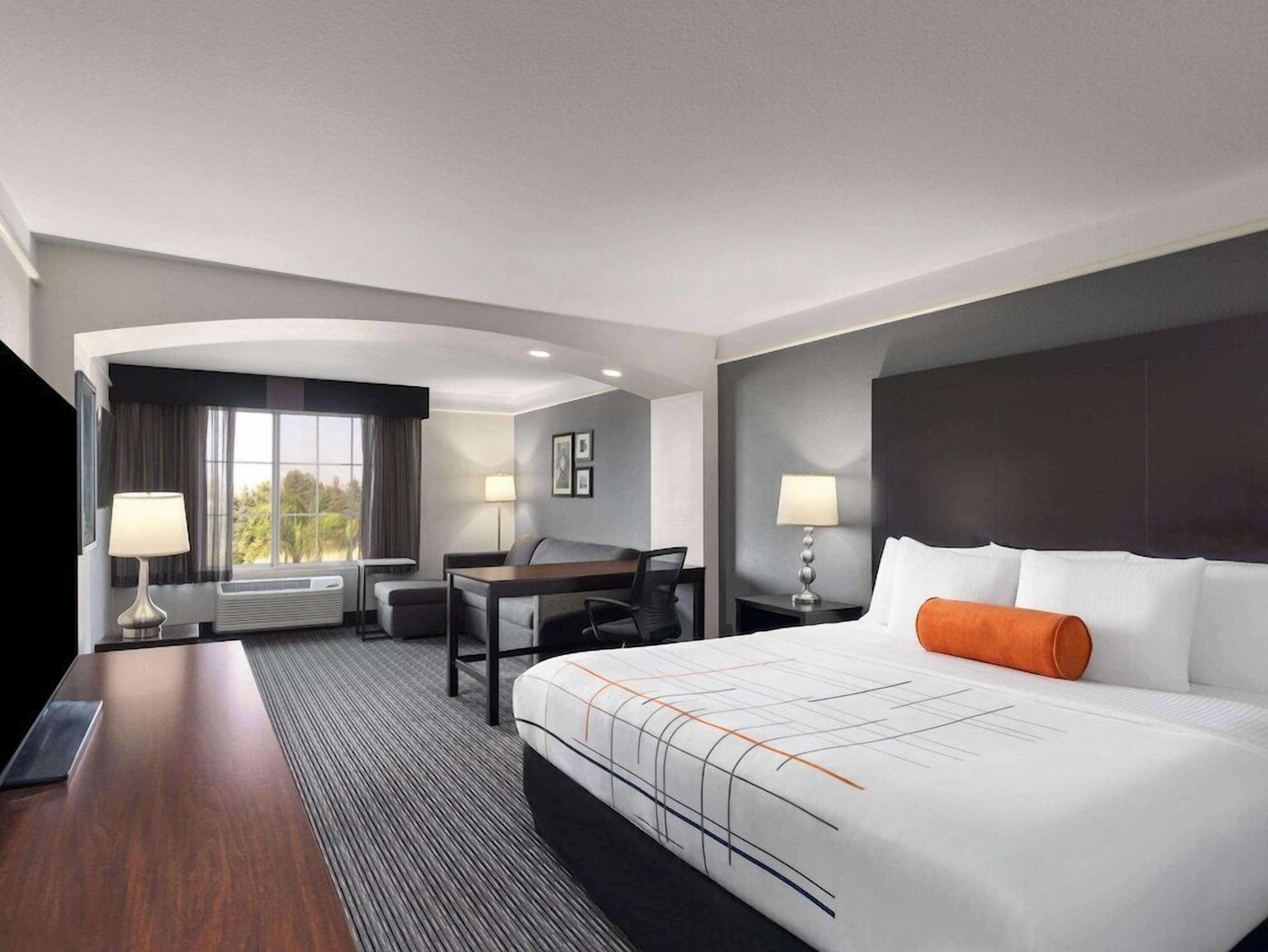 Premium bedding, desk, blackout drapes, iron/ironing board