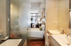 Luxury Studio, City View | Bathroom | Combined shower/bathtub, deep-soaking bathtub, rainfall showerhead - Apartments at Mandela Rhodes Place (Cape Town)