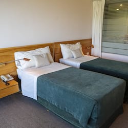 Quarto standard | 1 quarto, roupas de cama premium, edredons de pluma, frigobar