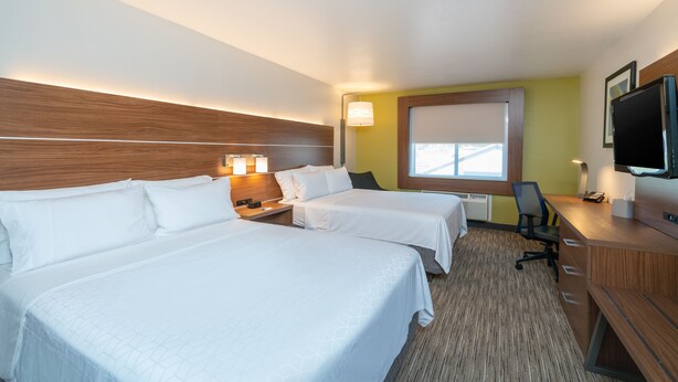 A hotel room with two beds, a desk, a chair, a TV, and a window. - Holiday Inn Express Hotel & Suites ELKINS by IHG (Elkins)