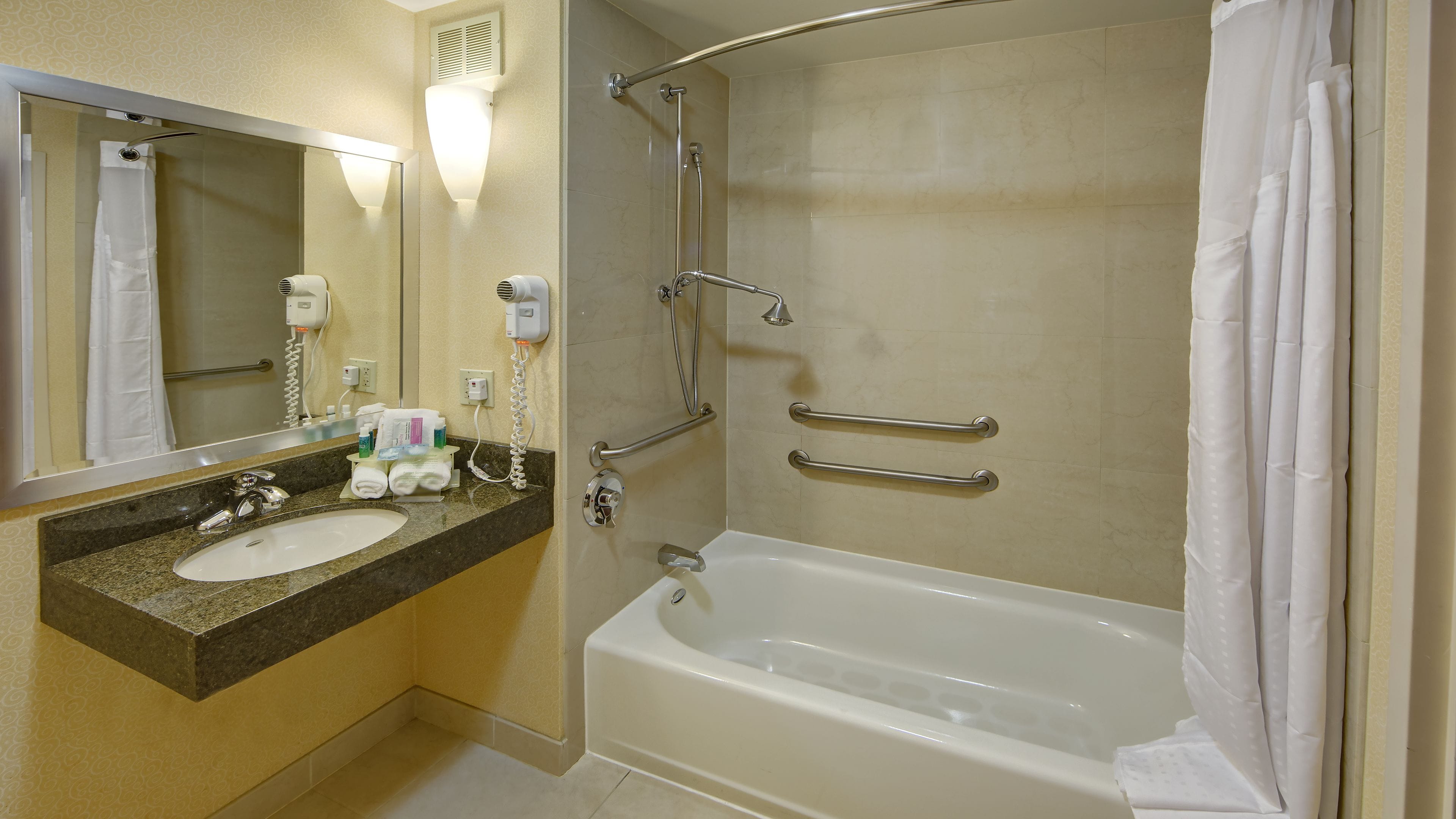 combined shower/bathtub, free toiletries, hair dryer, towels