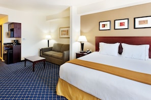 Suite, 1 King Bed, Non Smoking | Desk, laptop workspace, blackout drapes, iron/ironing board