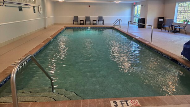 An indoor swimming pool with a 3 FT depth limit and no diving sign. - Stay Well Inn & Suites (Fort Myers)