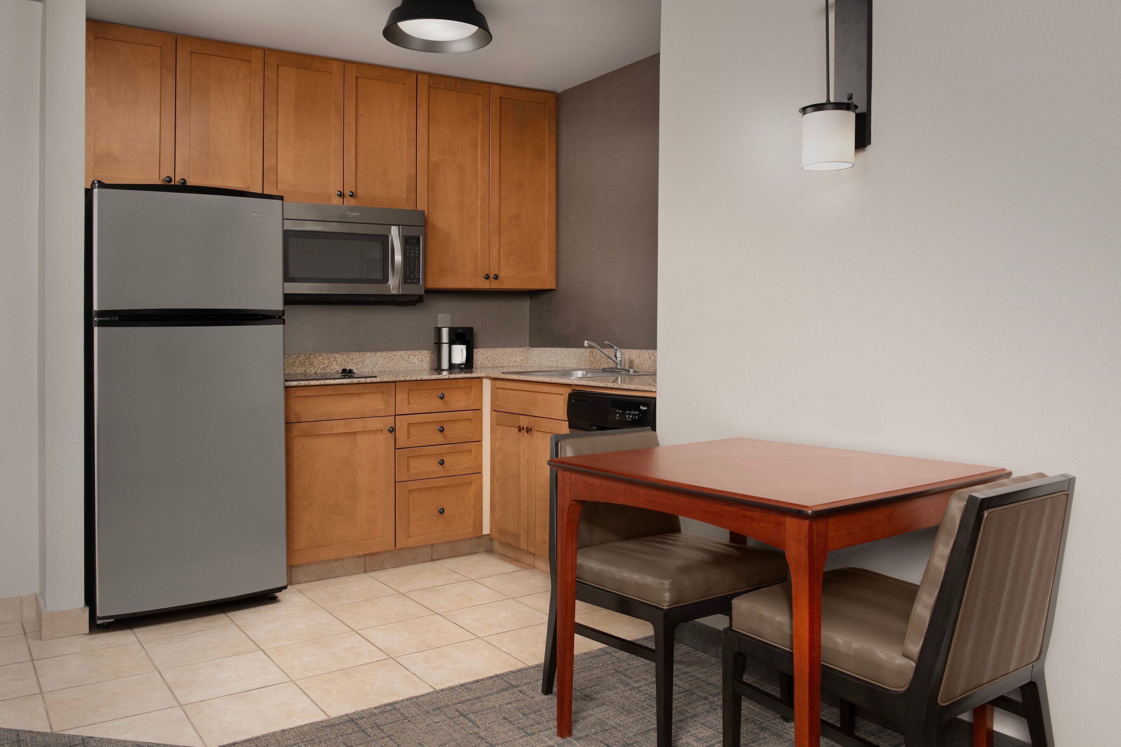 studio, 1 king bed with sofa bed | private kitchen | full-sized fridge, microwave, stovetop, dishwasher