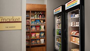 A snack and beverage vending area with a variety of snacks and drinks.
