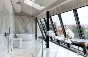 Designer toiletries, hair dryer, bathrobes, slippers