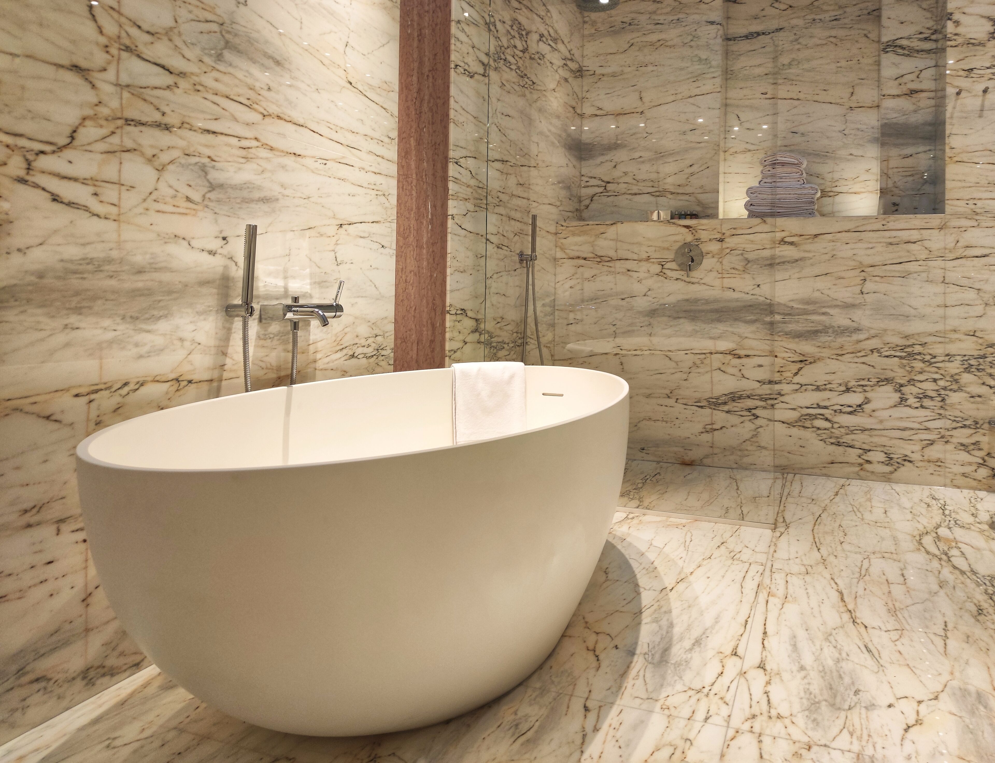 suite | bathroom | designer toiletries, hair dryer, bathrobes, slippers