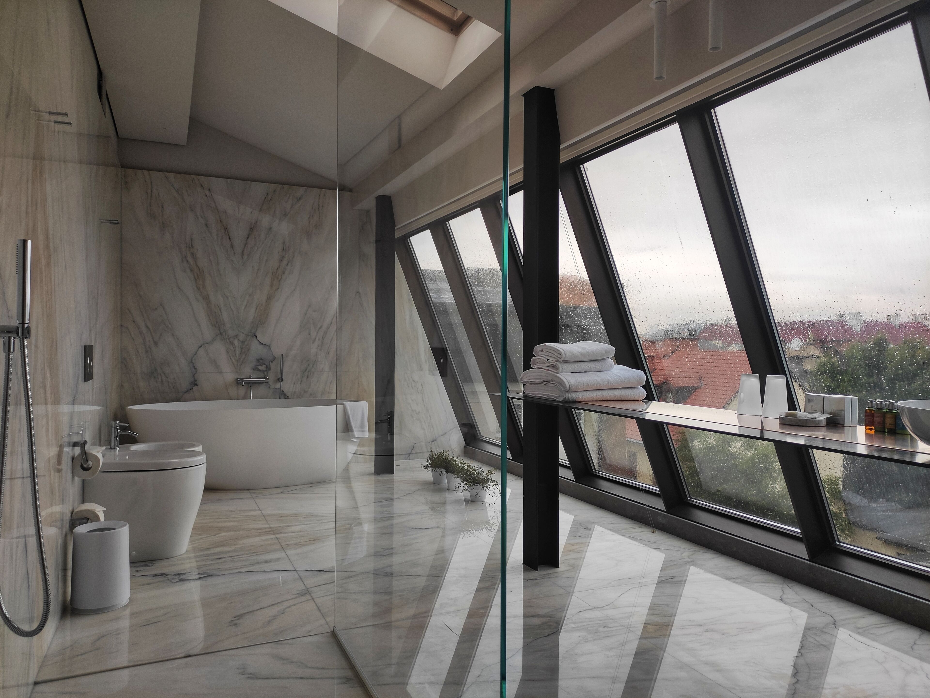 designer toiletries, hair dryer, bathrobes, slippers