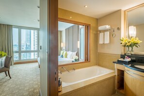 Separate bathtub and shower, eco-friendly toiletries, hair dryer