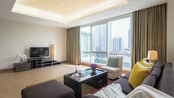 Premier Room, 1 Bedroom | Living area | TV