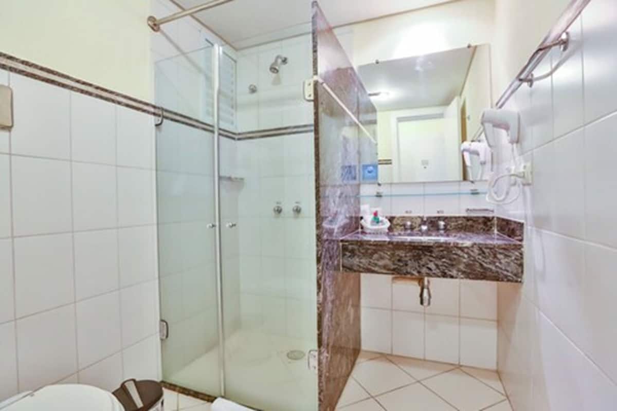 standard double room, 1 queen bed | bathroom | shower, free toiletries, hair dryer, towels