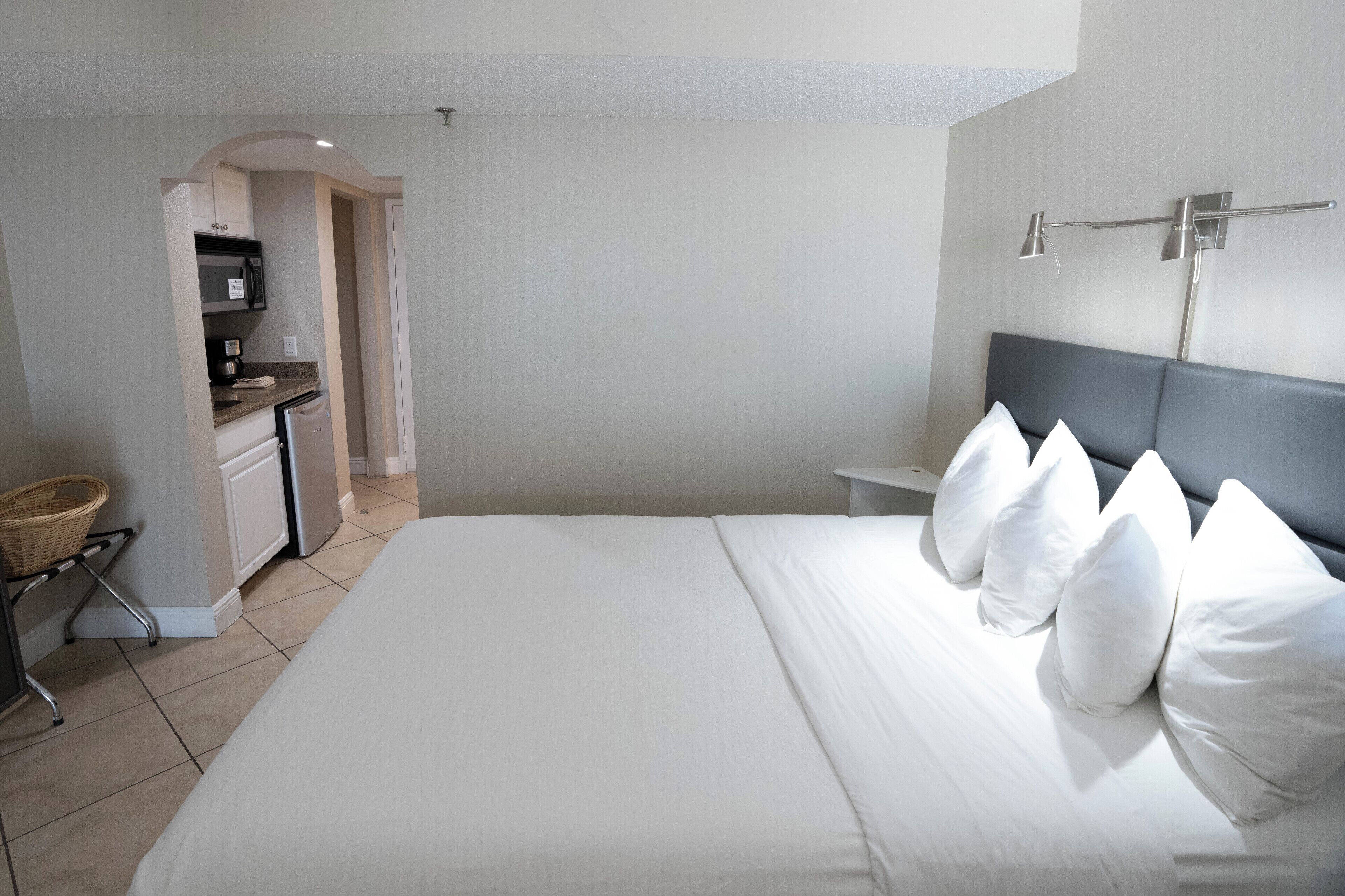 Studio, One King and One Sofa Bed, Pool View (Tropical Poolside Studio) | Iron/ironing board, cribs/infant beds, bed sheets