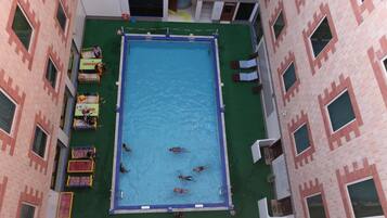 Outdoor pool, sun loungers