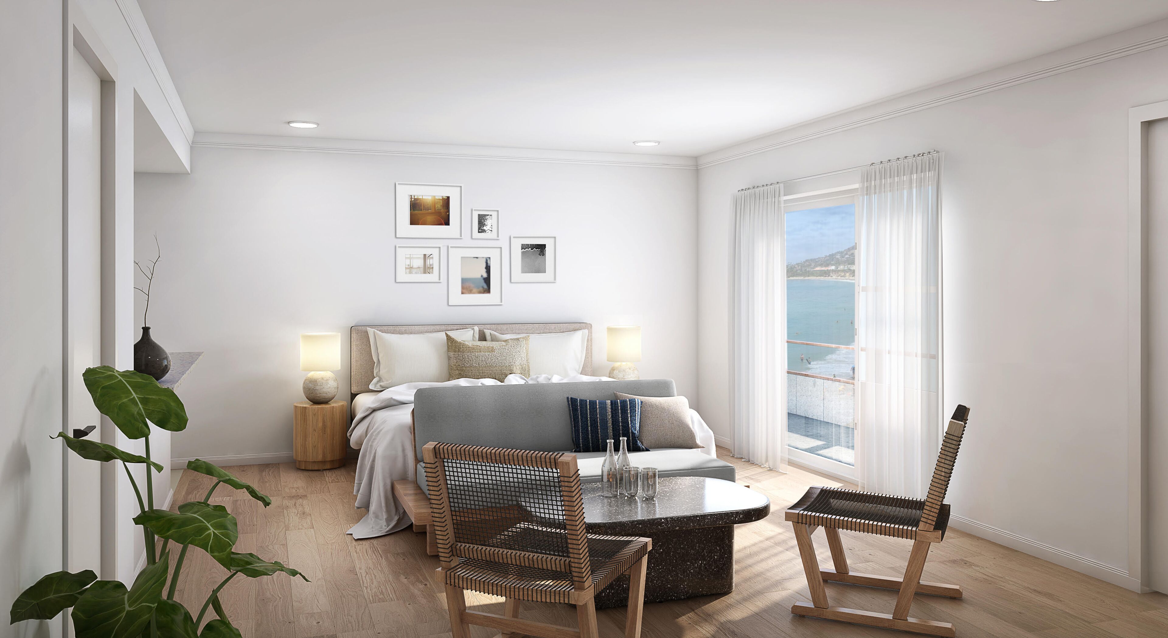 A modern bedroom with a bed, bedside tables, a seating area with chairs, and a large window with a view.