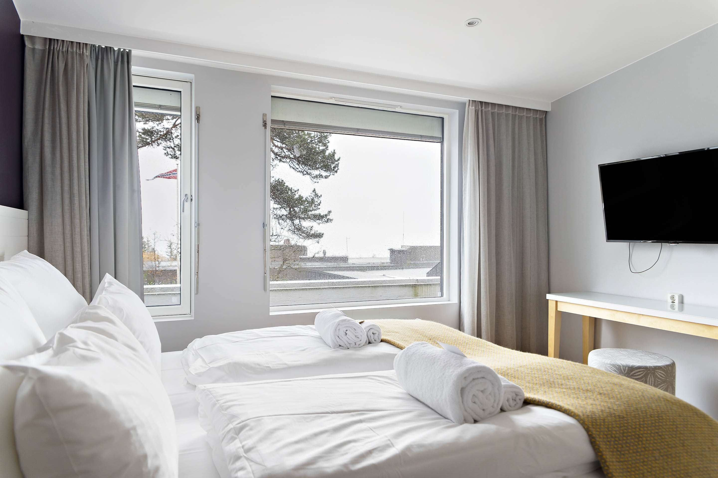 premium bedding, blackout curtains, cots/infant beds, rollaway beds