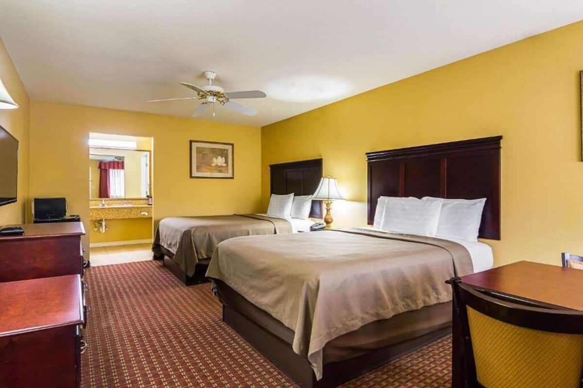 Standard Room, 2 Queen Beds, Non Smoking | Premium bedding, blackout drapes, iron/ironing board, WiFi (free)