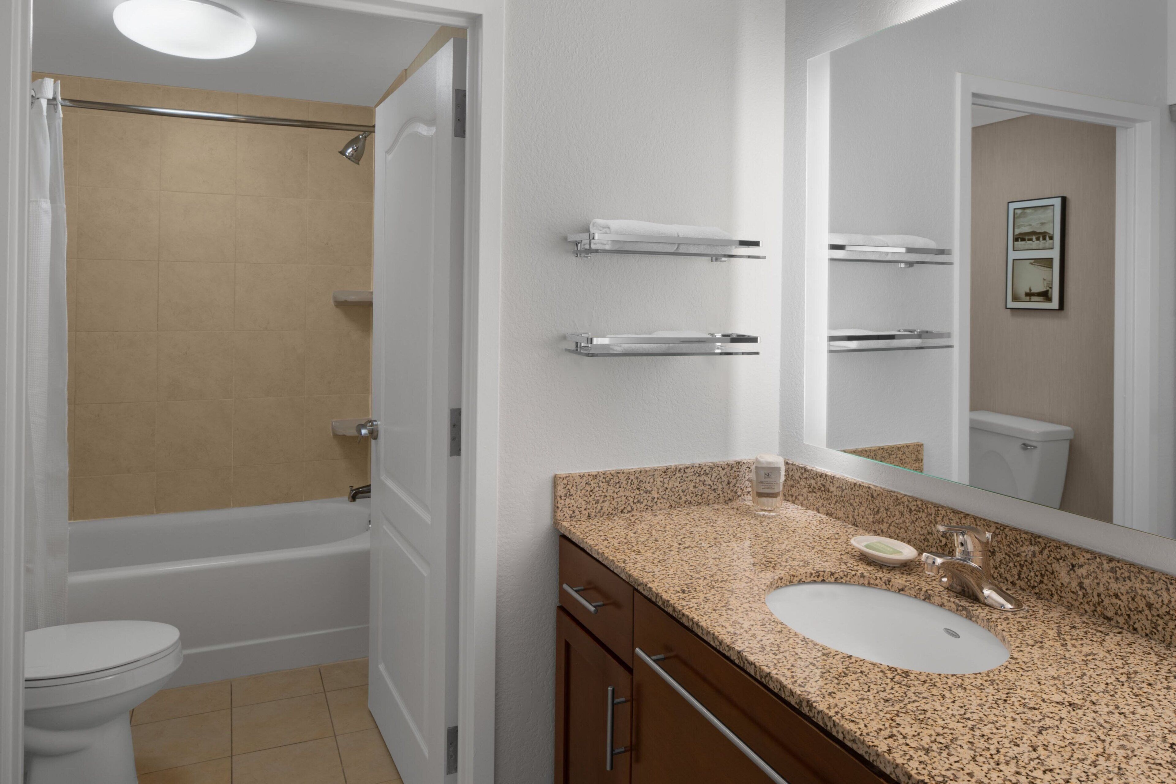 combined shower/bathtub, free toiletries, hair dryer, towels