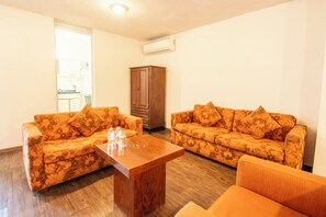 Junior Suite, 2 Double Beds, Terrace, City View | Living area | 32-inch LED TV with cable channels, TV