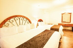 Standard Triple Room | Desk, blackout drapes, iron/ironing board, free WiFi