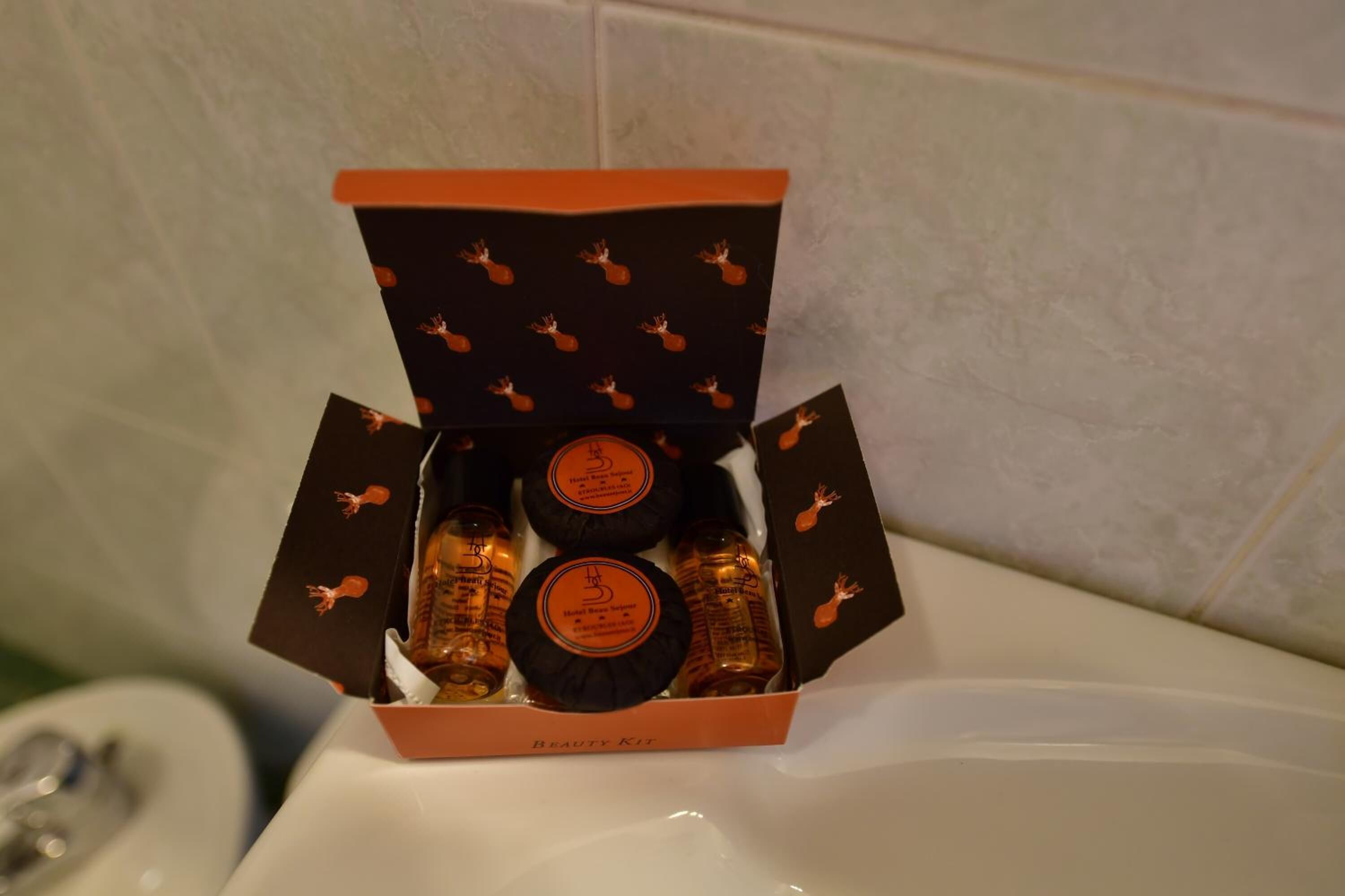 free toiletries, hair dryer, slippers, bidet