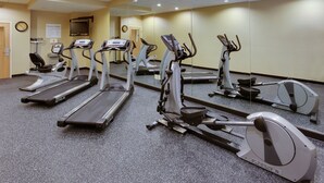 A fitness center with treadmills, elliptical machines, and a mirrored wall. - Holiday Inn Express Charles Town by IHG (Charles Town)