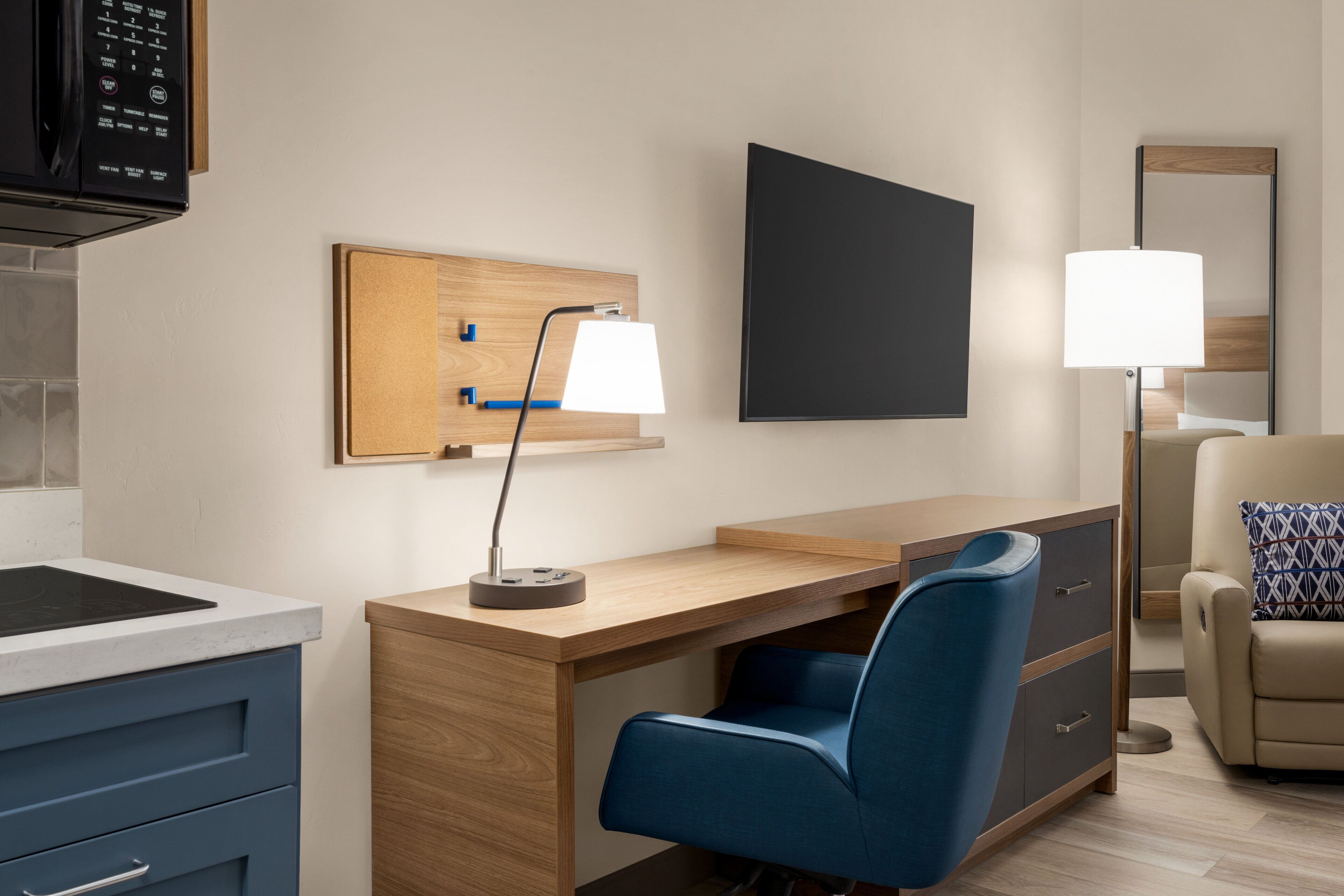 desk, laptop workspace, blackout curtains, iron/ironing board