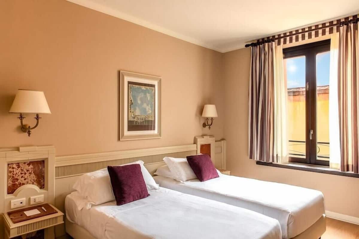 Hypo-allergenic bedding available, minibar, in-room safe, desk