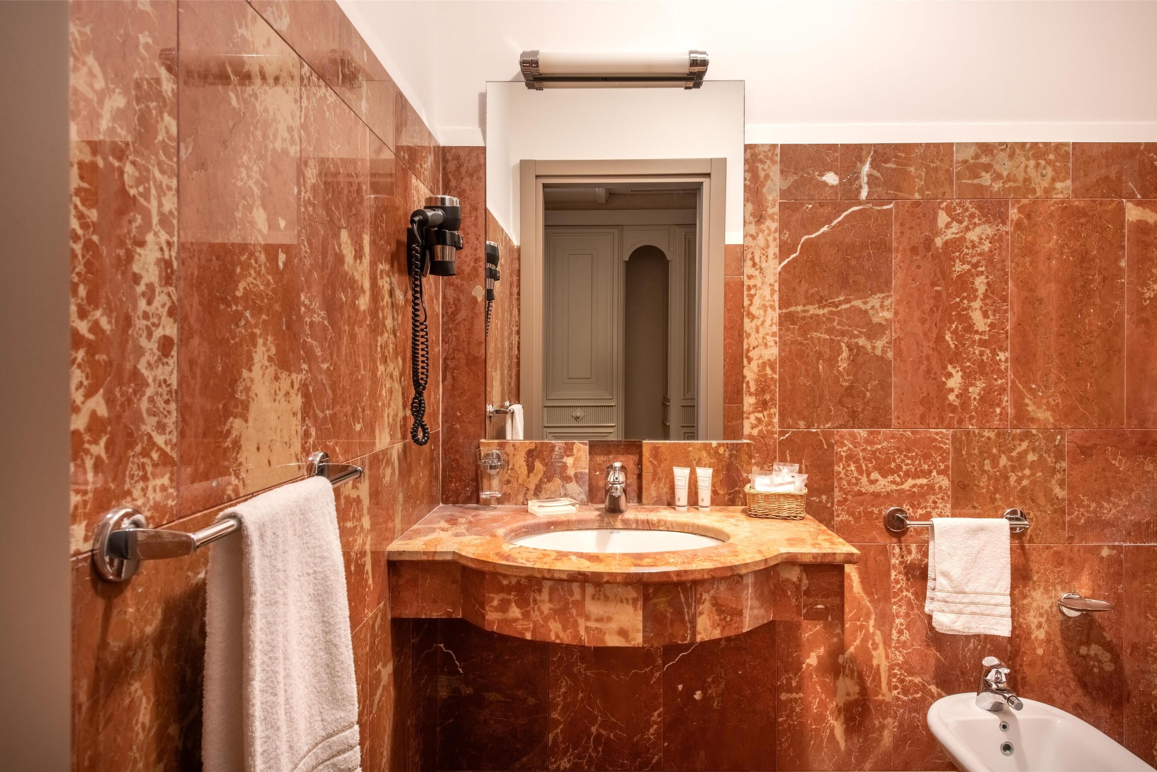 shower, free toiletries, hair dryer, bathrobes