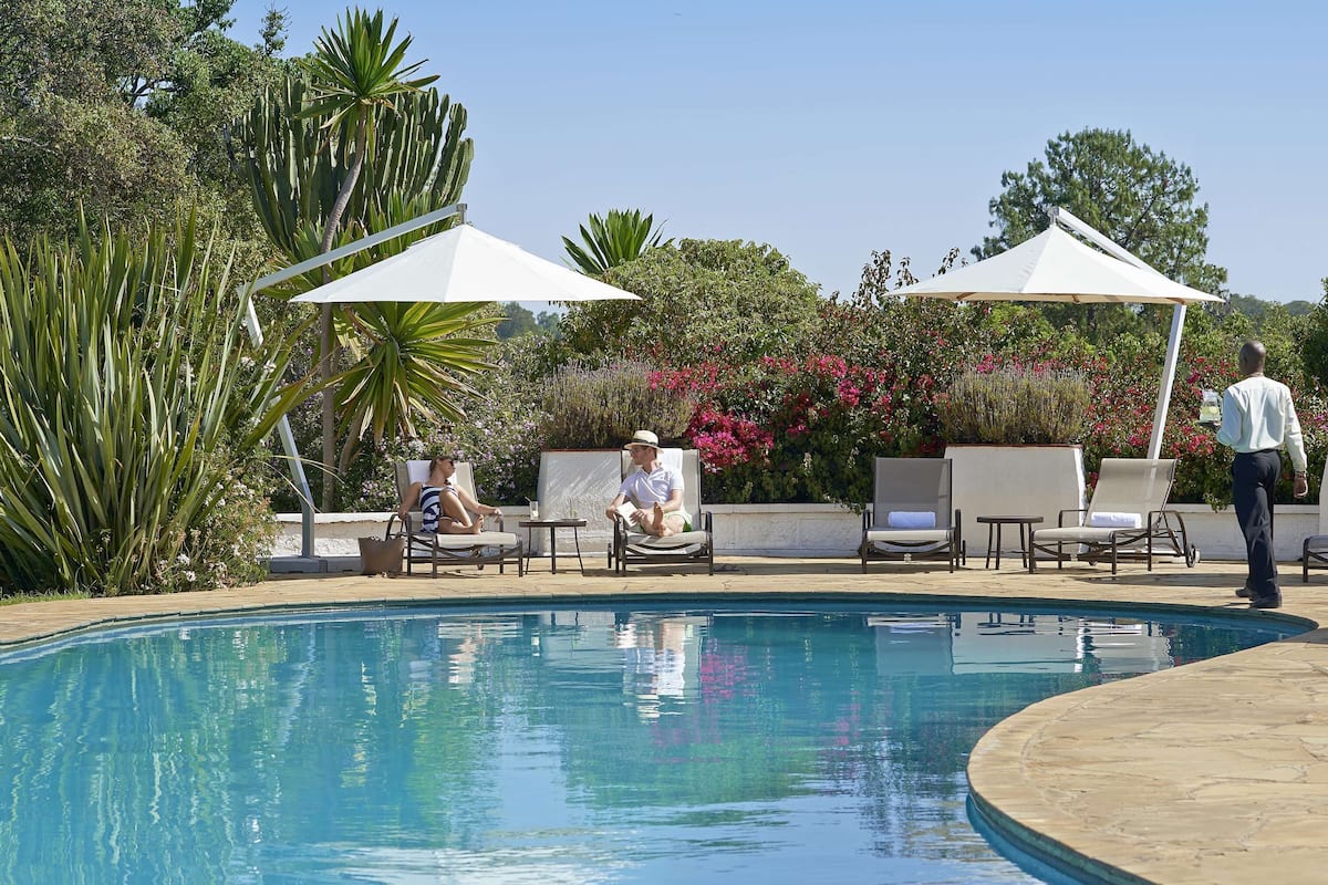 outdoor pool, pool loungers