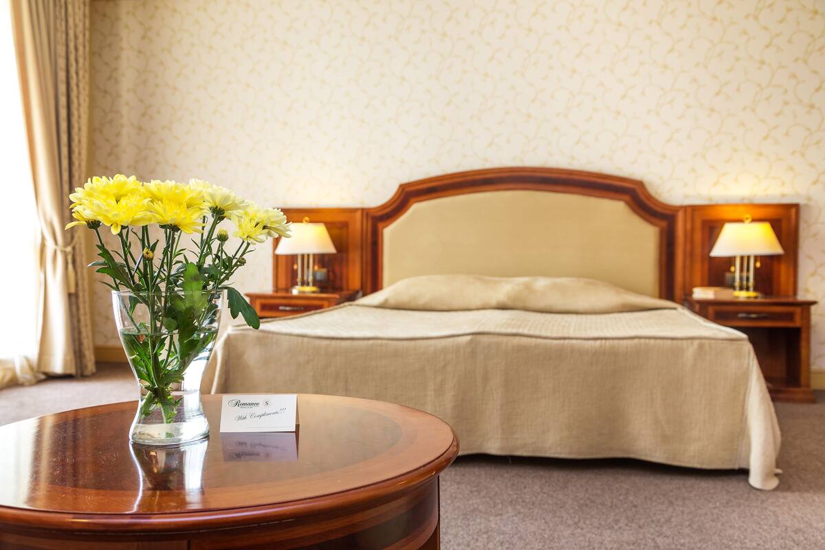 Desk, blackout drapes, bed sheets