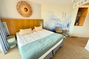 Deluxe Double Room, Partial Sea View | In-room safe, desk, laptop workspace, blackout drapes