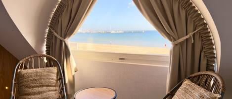 Deluxe Studio Suite, Balcony, Sea View | In-room safe, desk, laptop workspace, blackout drapes