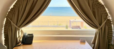 Deluxe Studio Suite, Balcony, Sea View | In-room safe, desk, laptop workspace, blackout curtains