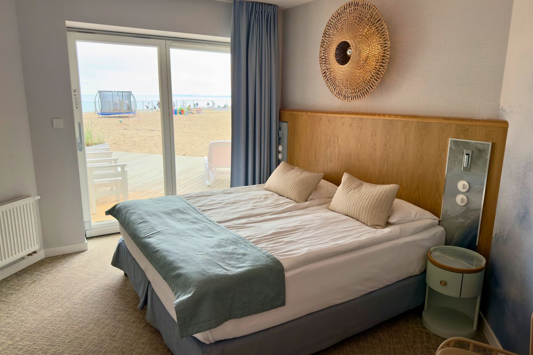 Deluxe Double Room, Partial Sea View | In-room safe, desk, laptop workspace, blackout drapes