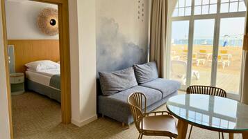 Deluxe Studio Suite, Sea View | In-room safe, desk, laptop workspace, blackout drapes