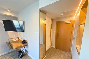 Deluxe Double Room, Partial Sea View | In-room safe, desk, laptop workspace, blackout drapes