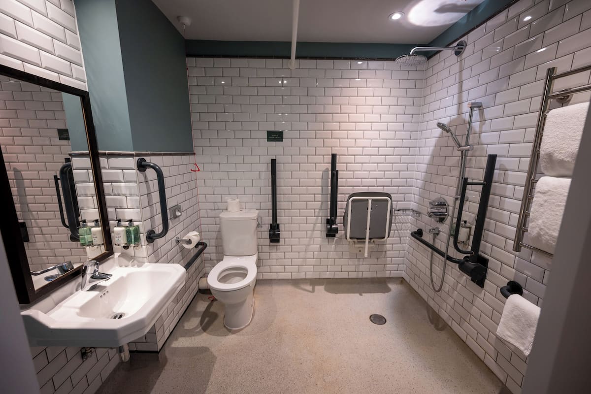 traditional twin room, 2 single beds | bathroom | shower, hair dryer, towels