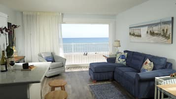 3rd Floor Ocean Front King Suite | Living room | Flat-screen TV