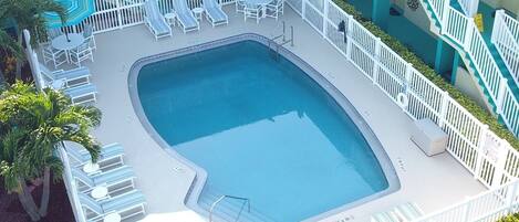 Deluxe Suite, 2 Bedrooms | Outdoor pool | Outdoor pool, a heated pool, open 9:00 AM to 9:00 PM, pool umbrellas