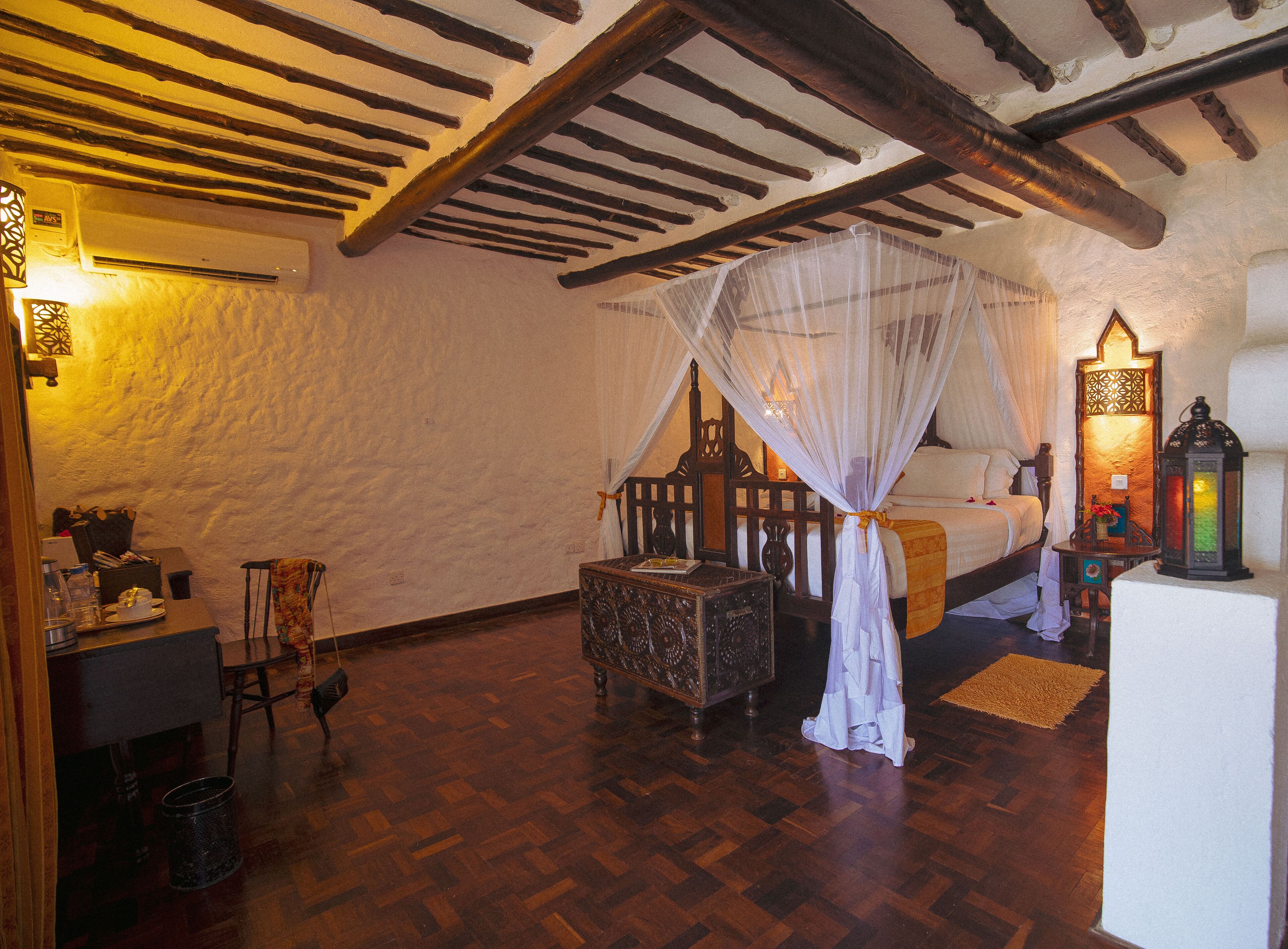 junior studio suite, 1 double bed, garden view | 1 bedroom, minibar, in-room safe, desk