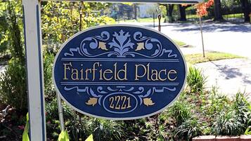 A house sign for Fairfield Place with the number 2221.