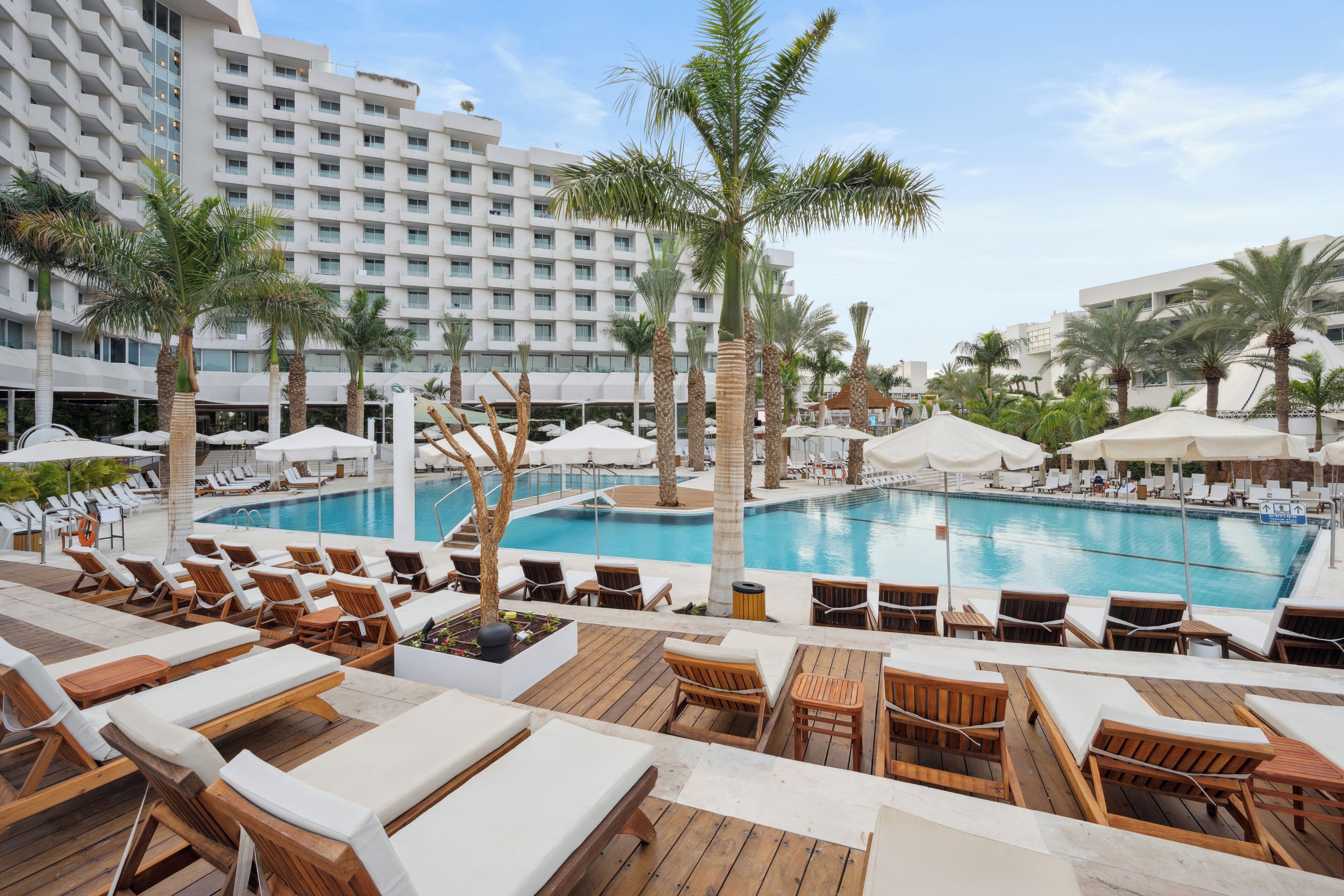 outdoor pool, pool umbrellas, pool loungers