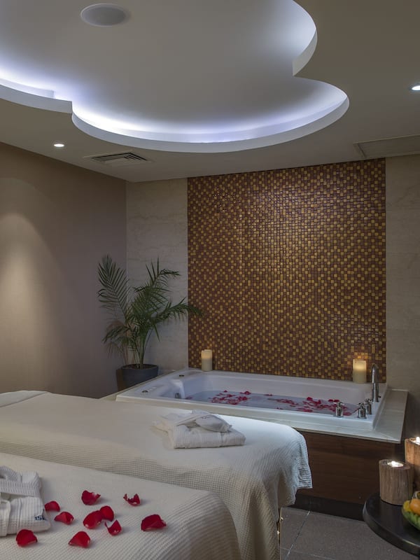 Hot tub, body treatments, deep-tissue massages, body wraps, facials