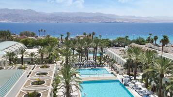 2 outdoor pools, pool umbrellas, pool loungers