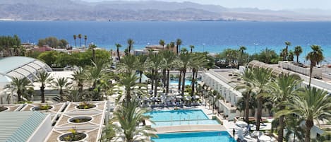 2 outdoor pools, pool umbrellas, sun loungers