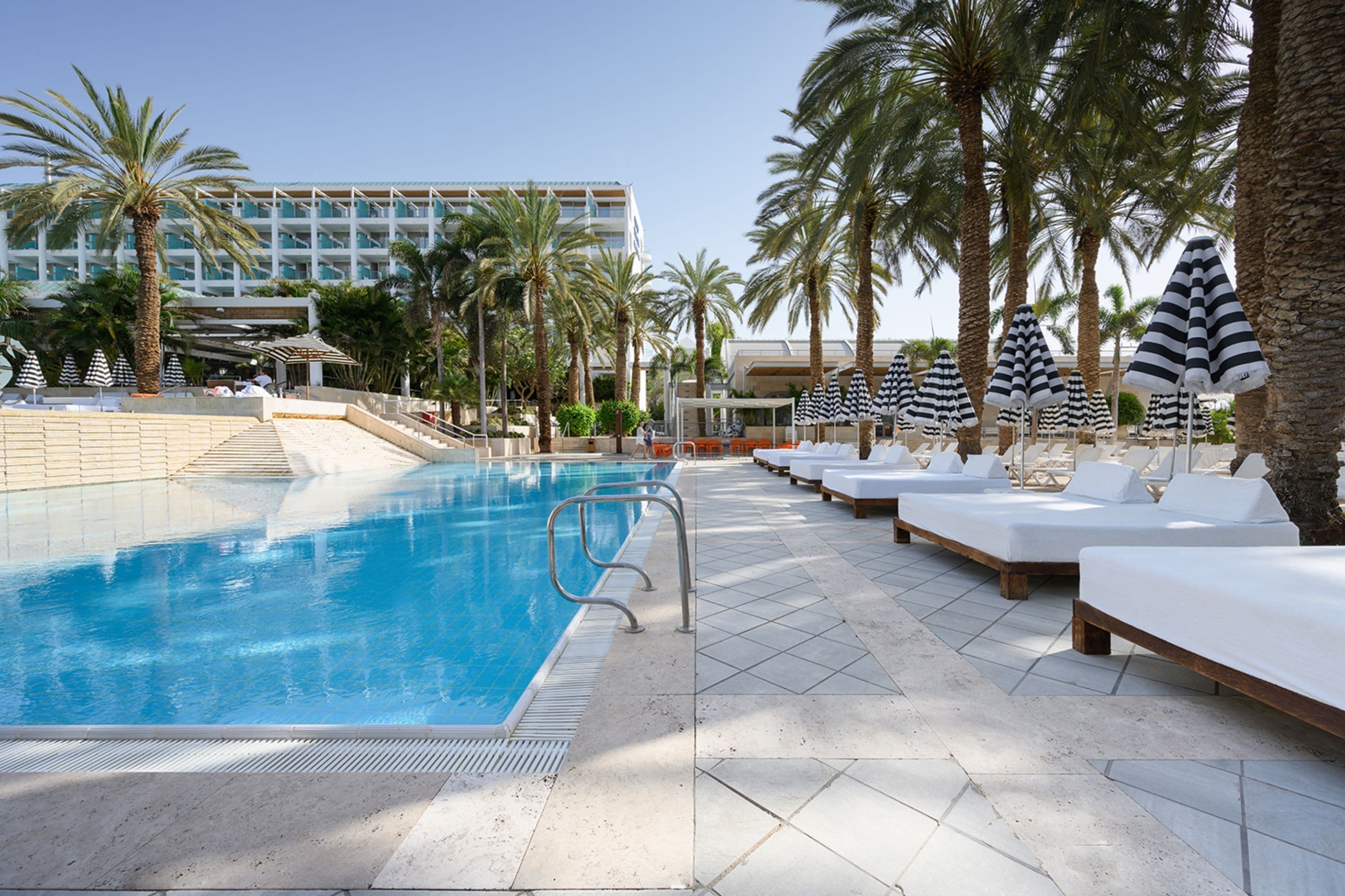 2 outdoor pools, pool umbrellas, pool loungers