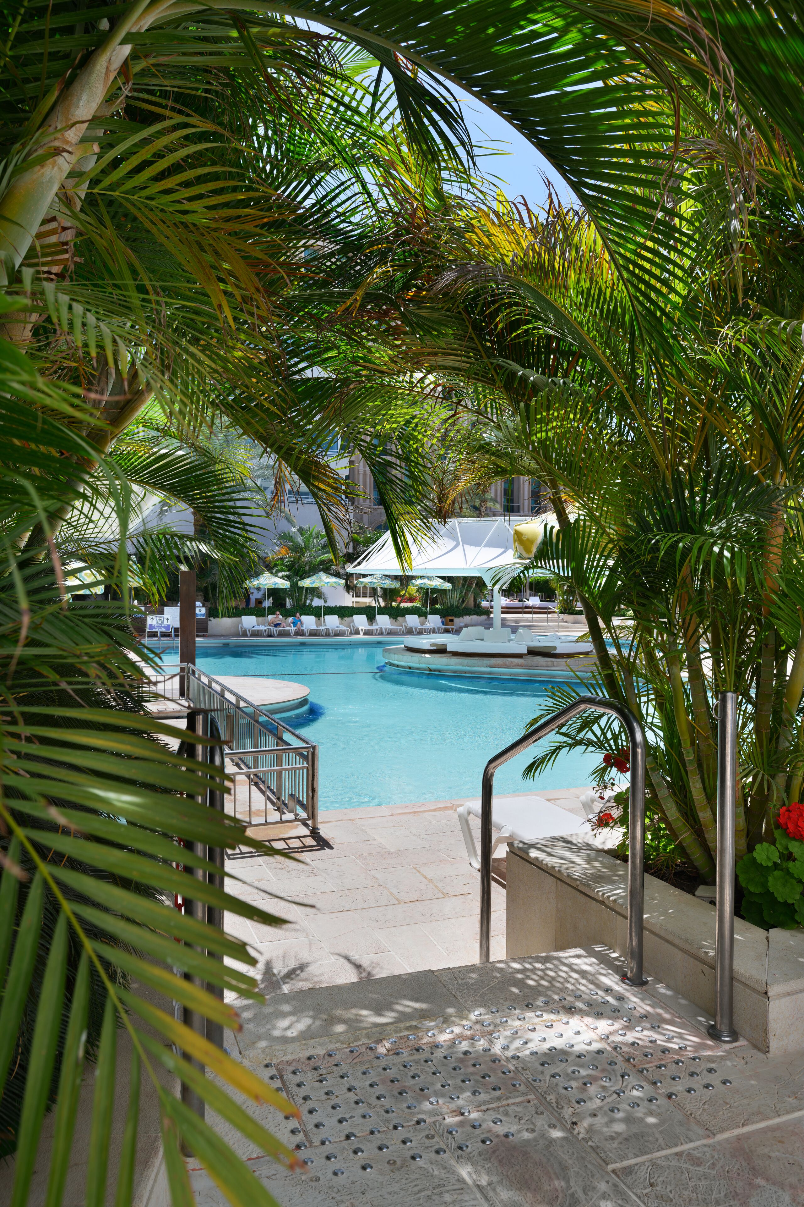 outdoor pool, pool umbrellas, pool loungers